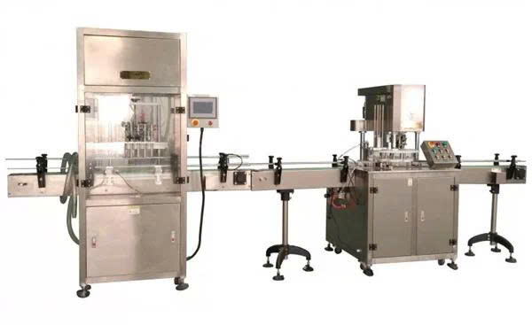 Máy chiết rót và dán kín chất lỏng tự động - ảnh 1