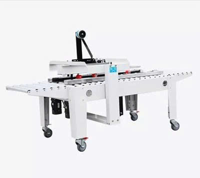 Máy dán băng keo thùng carton bán tự động hai động cơ Hualian FXJ-2550X