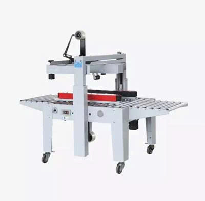 Máy dán băng keo thùng carton bán tự động Hualian FXJ-5050A (dùng băng keo BOPP)