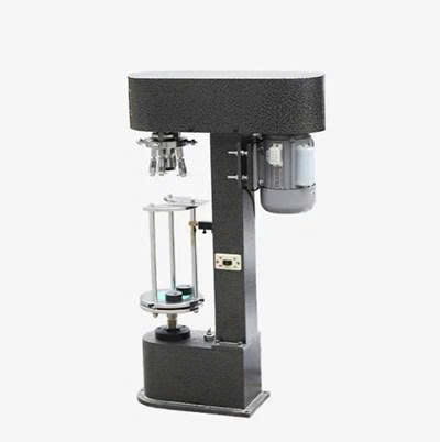 Máy đóng nắp chai loại có nắp chụp nhựa DK-50Z