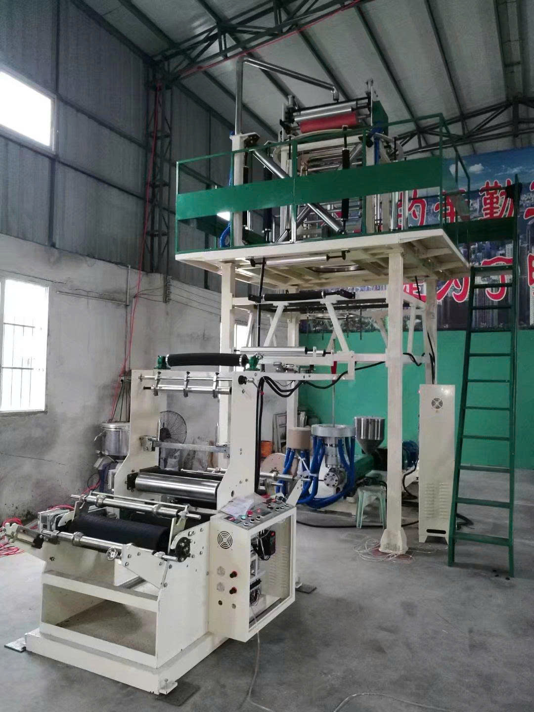 Máy thổi màng giàn xoay đứng MXCM-QY